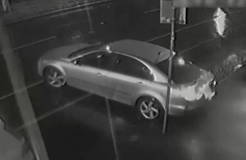 The two individuals used a Mazda sedan to break down the front door of a clothing store on Elgin Street, Carlton. 
