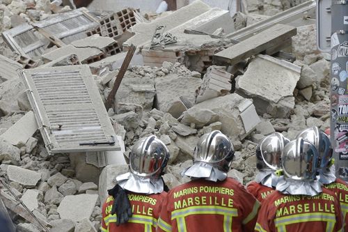 A fourth body has been found in the building which collapsed on Monday.