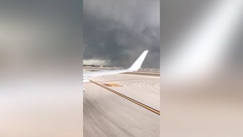 A tornado touched down at a US airport this week. (Storyful/Philip Hersh)