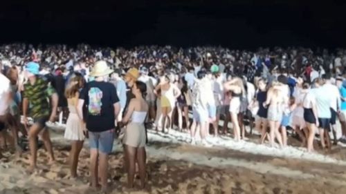 Scores of school leavers have forced Noosa's main beach to shut for cleaning and safety.