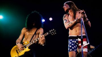 Slash and Axl Rose at a 1991 Guns N' Roses show. (Getty)