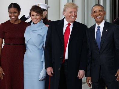 President Barack Obama, first lady Michelle Obama, President-elect Donald Trump and Melania Trump stand at the White House in Washington, Friday, Jan. 20, 2017. (AP Photo/Evan Vucci)