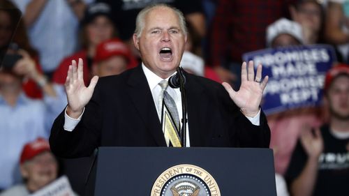 Late American radio personality Rush Limbaugh introducing President Donald Trump at the start of a campaign rally.