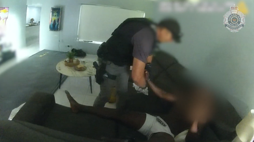 An alleged Lone Wolf bikie associate is one of two men charged over the kidnapping and extortion of a woman in Far North Queensland.