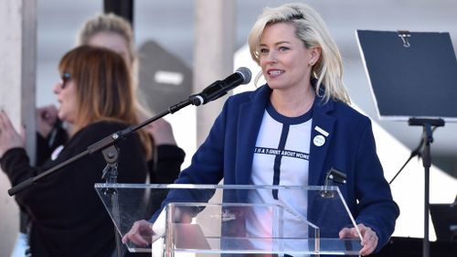 Pitch Perfect star and producer Elizabeth Banks speaking to protesters in Los Angeles. (PA)