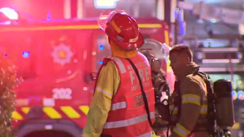 Trapped people jump from second storey of Adelaide building to escape 'deliberately lit' fire