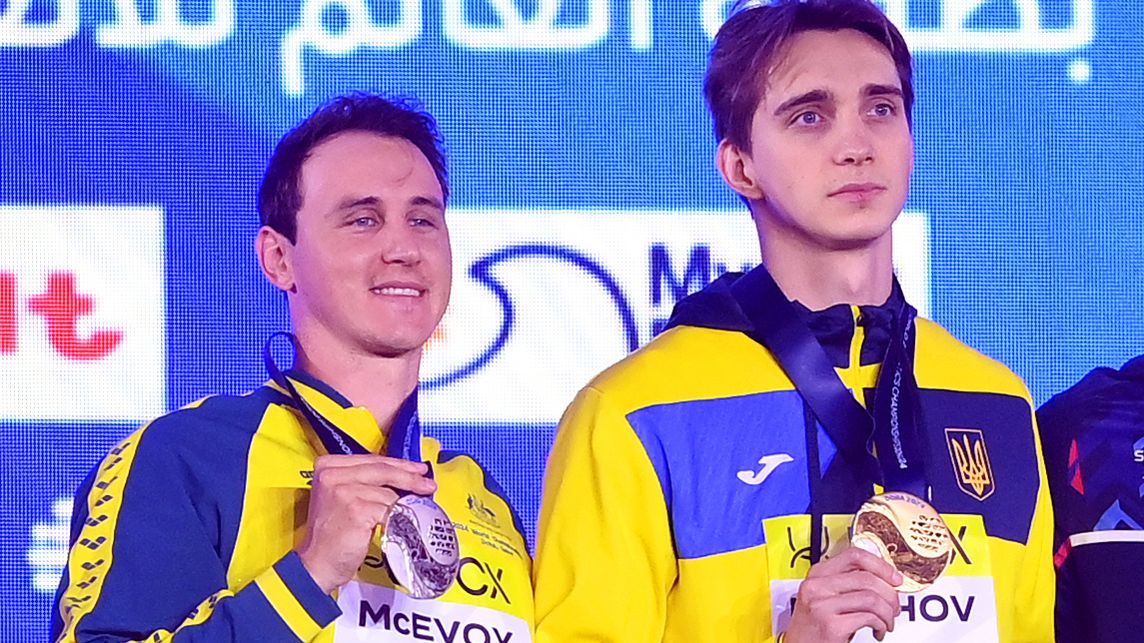 (L-R) Silver Medalist, Cameron McEvoy of Team Australia, Gold Medalist, Vladyslav Bukhov of Team Ukraine and Bronze Medalist, Benjamin Proud of Team Great Britain pose with their medals during the Medal Ceremony after the Men&#x27;s 50m Freestyle Final on day sixteen of the Doha 2024 World Aquatics Championships at Aspire Dome on February 17, 2024 in Doha, Qatar. (Photo by Adam Nurkiewicz/Getty Images)