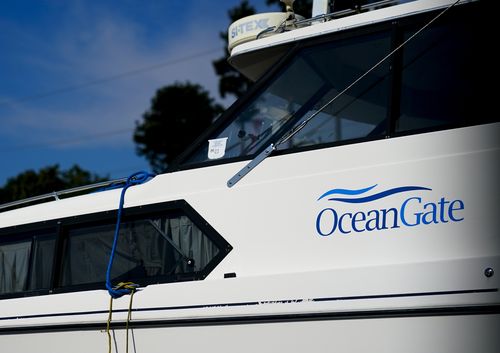 A boat with the OceanGate logo is parked on a lot near the OceanGate offices Thursday, June 22, 2023, in Everett, Wash.  