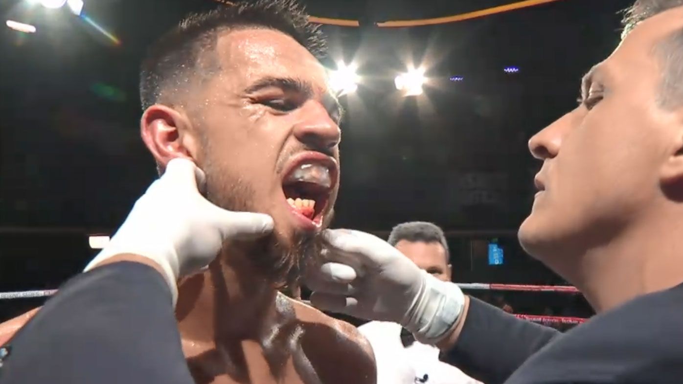 Aussie boxer stuns commentators after fighting five rounds with broken jaw