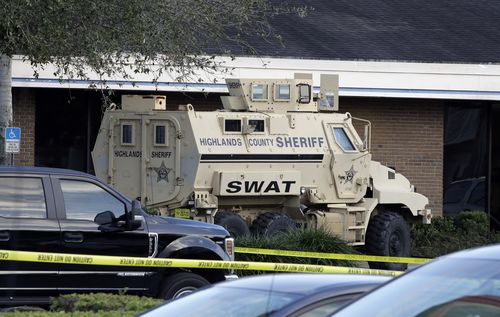 A Highlands County Sheriff's SWAT vehicle is stationed out in front