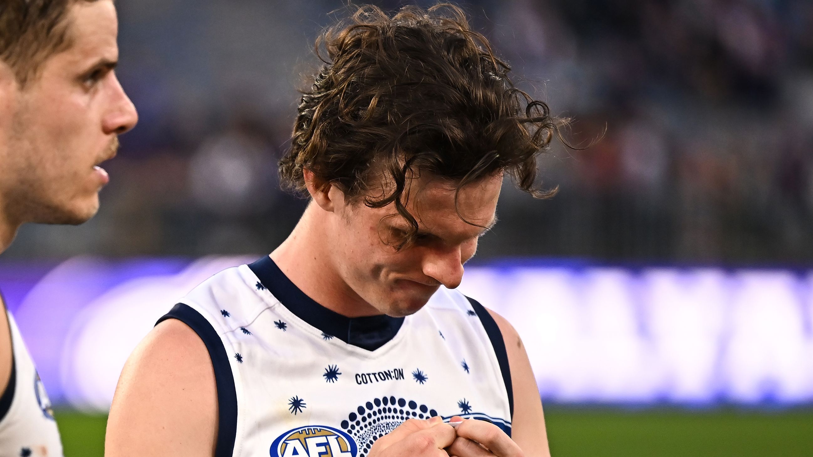 PERTH, AUSTRALIA - MAY 20: Max Holmes of the Cats looks dejected after a loss during the 2023 AFL Round 10 match between Walyalup/Fremantle Dockers and the Geelong Cats at Optus Stadium on May 20, 2023 in Perth, Australia. (Photo by Daniel Carson/AFL Photos)