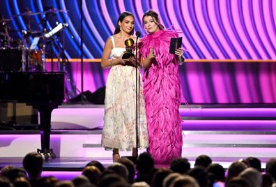 Emily Bear and Abigail Barlow accept the Musical Theater Album award onstage during the 64th Annual Grammy Awards.