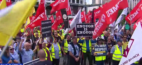 Hundreds of bus drivers and council workers stormed Brisbane's City Hall. (9NEWS)