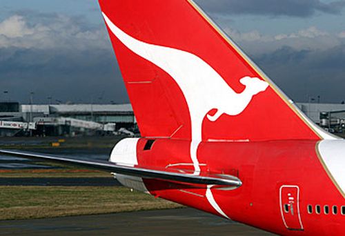 Qantas jet at international airport (Getty)