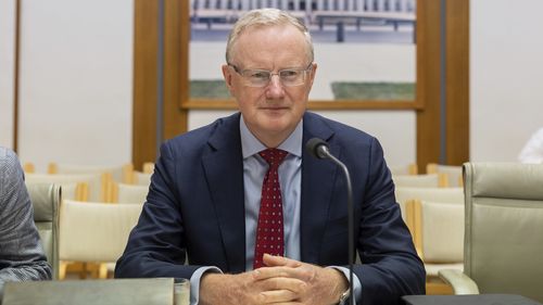 Philip Lowe faces House Economics Committee hearing at Parliament House in Canberra last month.