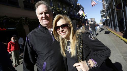 Sean and Leigh Anne Tuohy stand on a street in New Orleans