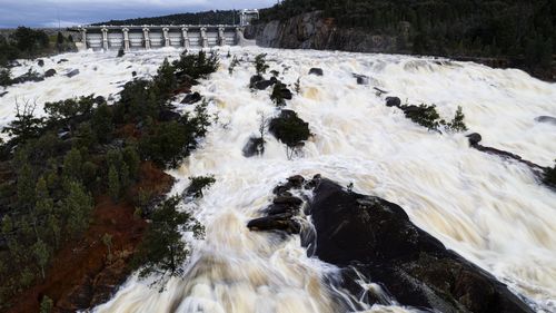 Yesterday the dam spilt after reaching almost 104 per cent capacity and made its way downriver.