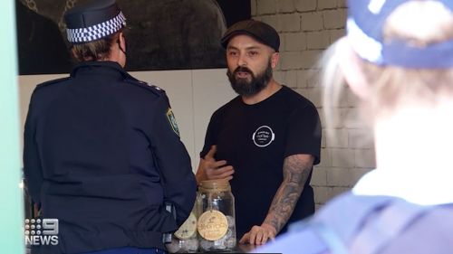 A NSW cafe owner has been fined for refusing to wear a mask.