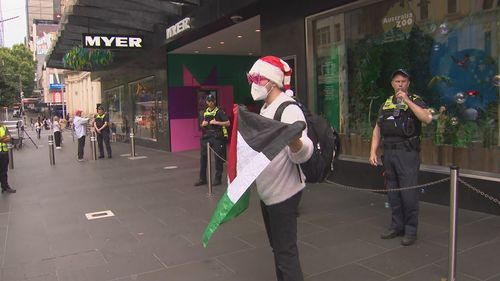 Pro-Palestine protesters outside Myer in Melbourne's Bourke Street Mall November 17, 2024