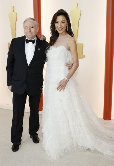 HOLLYWOOD, CALIFORNIA - MARCH 12: (L-R) Jean Todt and Michelle Yeoh attend the 95th Annual Academy Awards on March 12, 2023 in Hollywood, California. (Photo by Mike Coppola/Getty Images)