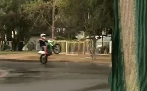 Footage obtained by A Current Affair earlier this year shows riders  filmed doing wheel stands, taking shortcuts down footpaths and speeding through residential streets on unregistered bikes. Picture: 9NEWS