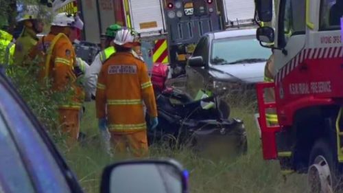 Emergency services at the scene of the crash. (9NEWS)