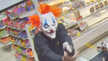 The clown allegedly robbed a service station of cash in Brisbane.