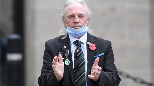A veteran wearing a mask is seen attending VE Day commemorations at the Cenotaph on May 8, 2020 in London, United Kingdom