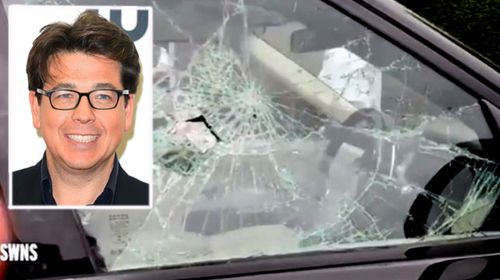 Comedian Michael McIntyre's Range Rover was smashed with a hammer in north London by moped riding thugs. (Photos: AAP/SWNS).