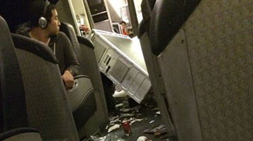 A photo uploaded to Marc Stanley's Facebook page shows the drink cart that was knocked over due to the intense turbulence. (Supplied)