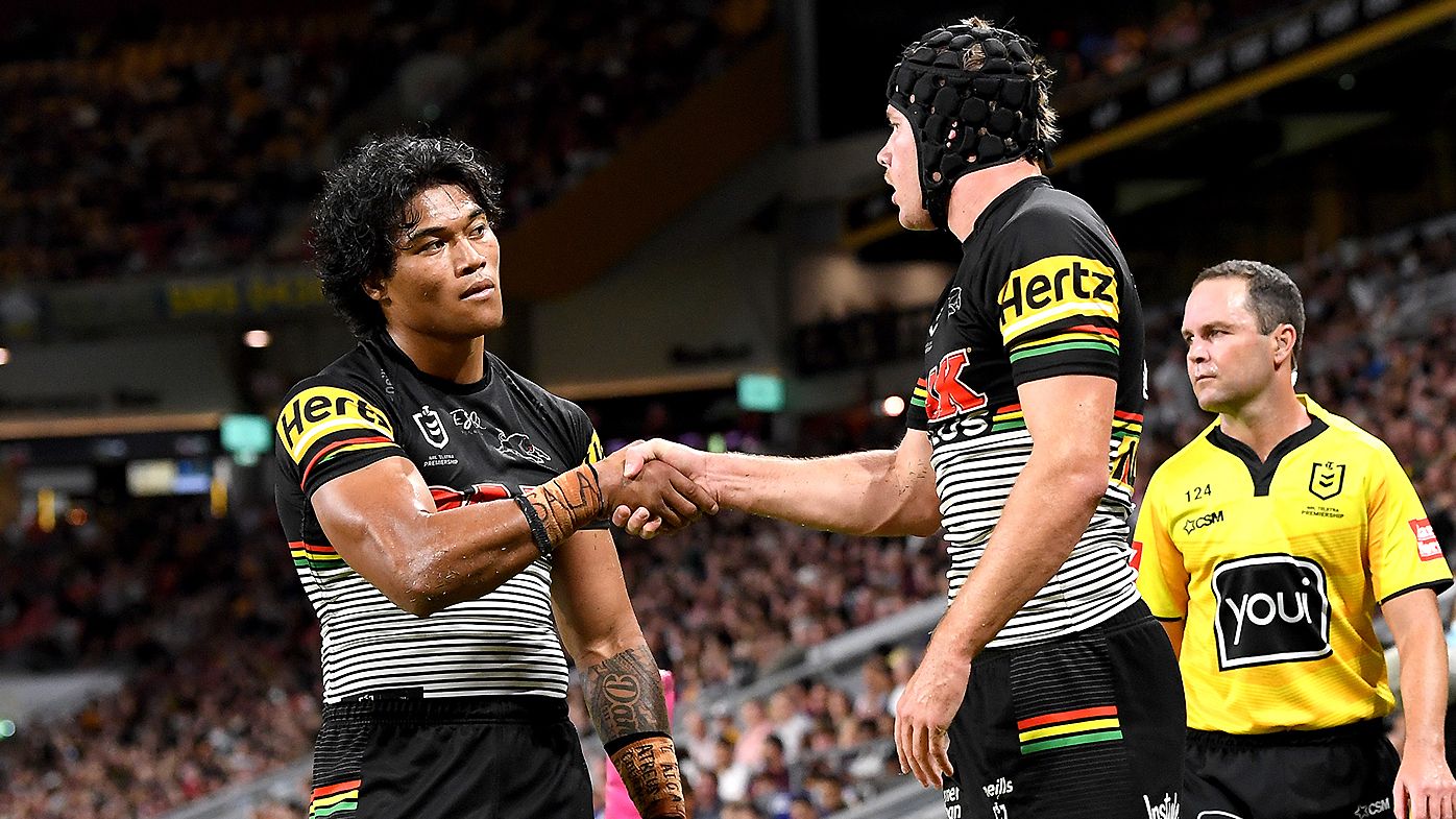 Panthers Players Lead Their Team Into The Stadium Background