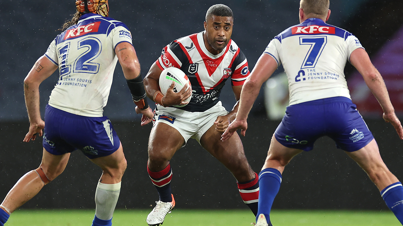 Michael Jennings is tackled during the round five NRL match between the Canterbury Bulldogs and the Sydney Roosters.