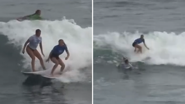 Aussie surfer blocked by rival