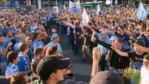 Passionate fans showed their excitement outside the ground. (9NEWS)