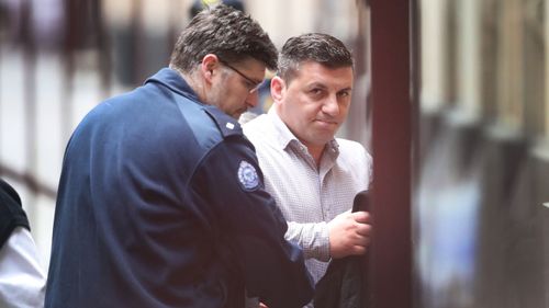 George Matte-Hado is taken from a prison van into the Melbourne Supreme Court. (AAP)