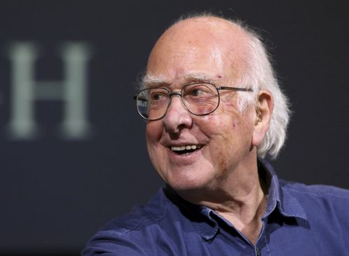 Britain's Professor Peter Higgs smiles during a press conference in Edinburgh, Scotland, on October 11, 2013.  