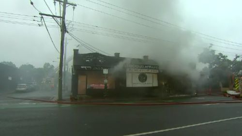 Fire tore through the popular shops this morning.