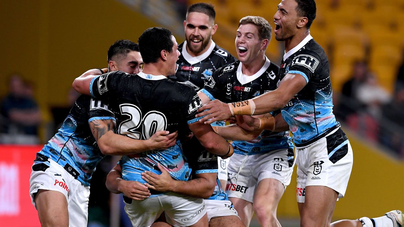Sharks get the better of the Broncos. (Getty)