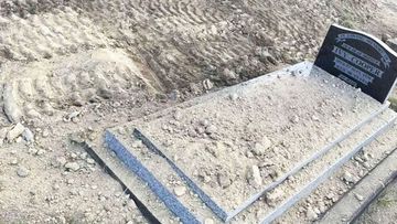 This photo shows a filled-in grave, which was dug in the wrong location at Uralla Cemetery for Leslie Dawson&#x27;s funeral. 