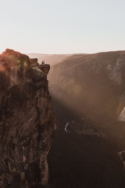 Freelance photographer Matt Dippel accidentally captured this photo of a proposal happening on Taft Point's cliff edge (Matthew Dippel).