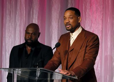(L-R) Honorees Antoine Fuqua and Will Smith accept The Beacon Award for "Emancipation" onstage during the 14th Annual AAFCA Awards at Beverly Wilshire, A Four Seasons Hotel on March 01, 2023 in Beverly Hills, California.