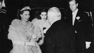 The Queen attends the 1952 Royal Variety Performance with Princess Margaret and Prince Philip