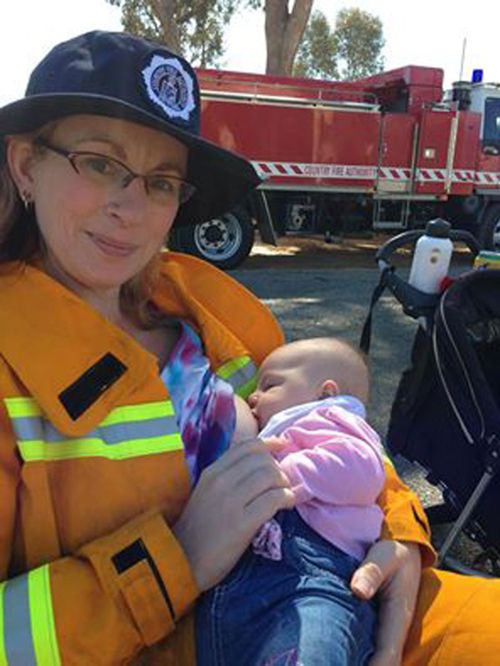 Angela Joy breastfeeds at a CFA community event. (Image: Country Fire Association/Facebook)