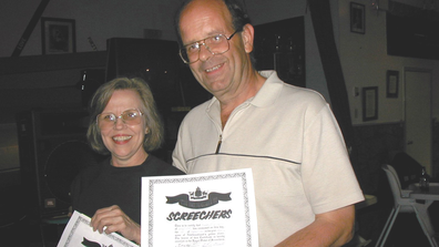 Nick and Diane at the Screech-In ceremony. Gander, 2001.