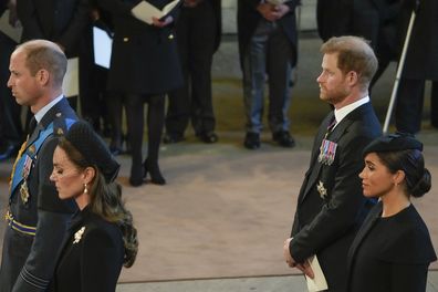 Britain's Kate, Princess of Wales, from left, Prince William, Meghan, Duchess of Sussex and Prince Harry stand in Westminster Hall after participating in the procession of the coffin of Queen Elizabeth, London, Wednesday, Sept. 14, 2022. The Queen will lie in state in Westminster Hall for four full days before her funeral on Monday Sept. 19. (AP Photo/Gregorio Borgia, Pool)