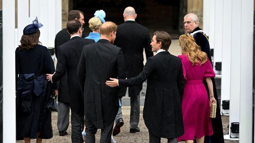 LONDON, ENGLAND - MAY 06:  Prince Harry, Duke of Sussex arrives with Princess Beatrice and her husband Edoardo Mapelli Mozzi to attend the Coronation of King Charles III and Queen Camilla on May 6, 2023 in London, England. The Coronation of Charles III and his wife, Camilla, as King and Queen of the United Kingdom of Great Britain and Northern Ireland, and the other Commonwealth realms takes place at Westminster Abbey today. Charles acceded to the throne on 8 September 2022, upon the death of hi