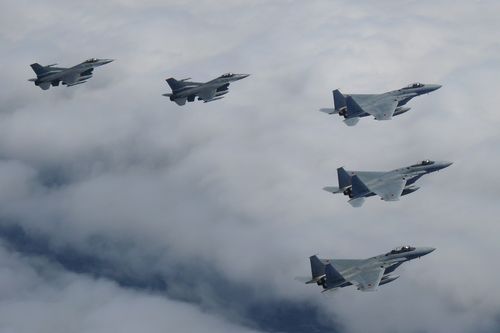 Japanese and U.S. joint fighter jets fly in formation over the Sea of Japan, Tuesday, June 7, 2022. Japanese and U.S. militaries conducted joint fighter jet flight drills over the Sea of Japan amid increasingly severe security environment such as North Koreas repeated ballistic missile firing, Japans Defense Ministry announced Tuesday 