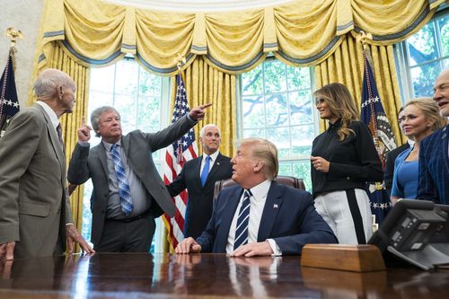 US President Donald J. Trump welcomes astronauts Buzz Aldrin (R), Michael Collins (L), and Andrew Armstrong (C-L), the son of Neil Armstrong, to the Oval Office honor the 50th anniversary of the Apollo moon landing in the Oval Office of the White House.