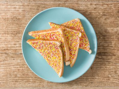 Traditional Australian fairy bread on wooden table