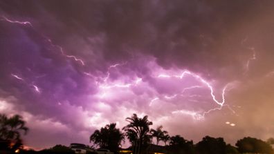 IN PICTURES: Night sky lights up as wild storm rolls over south-east Queensland (Gallery)